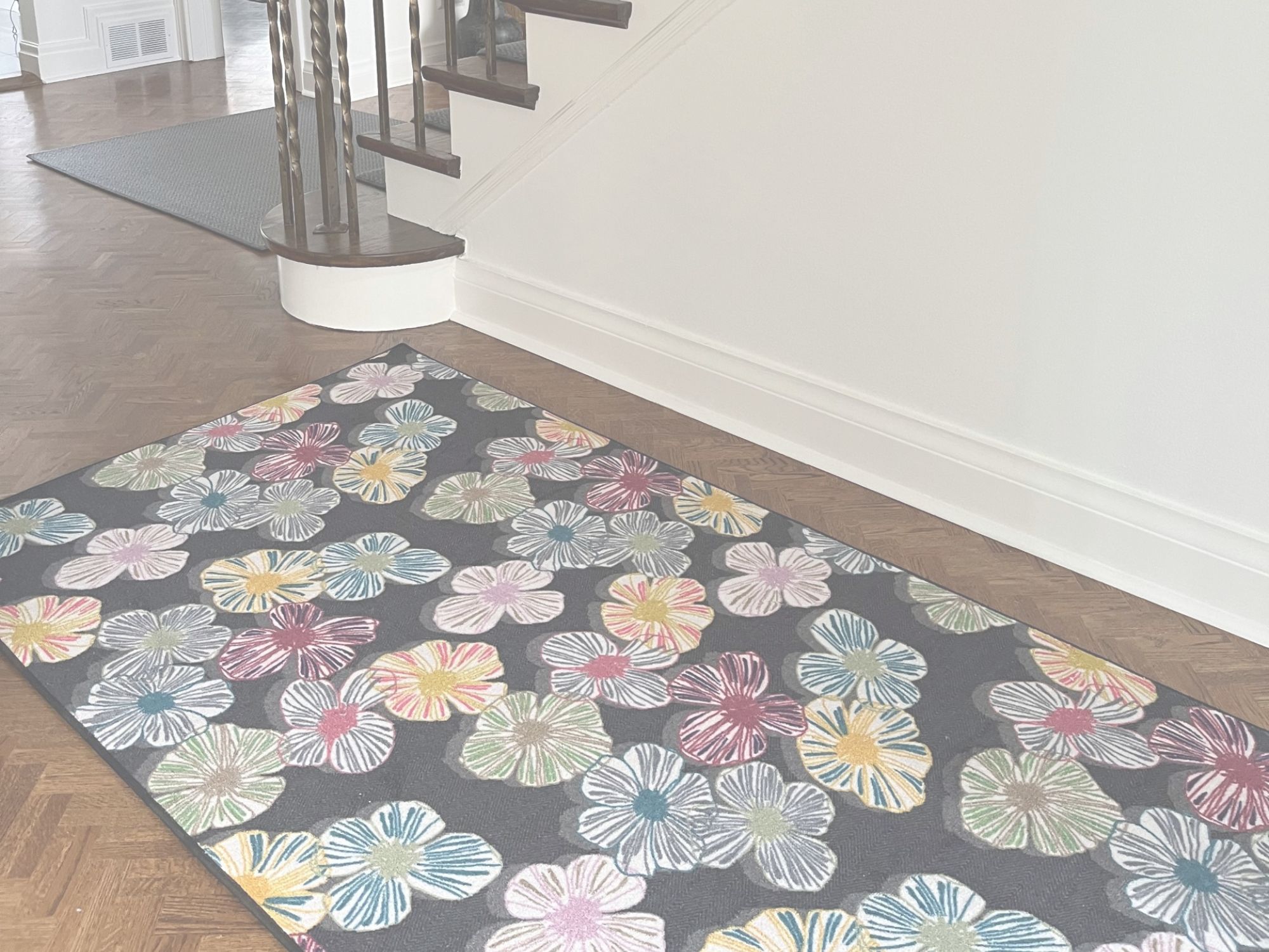 patterned floral area rug in a Toronto hallway